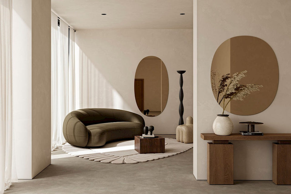 Oval Bronze large mirror by Deknudt Mirrors in a modern living room