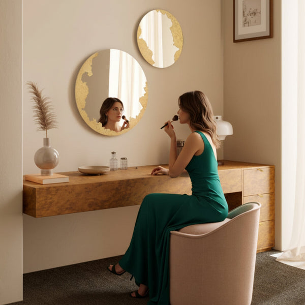 Ornato round gold mirror with unique rotating frame, handcrafted in Belgium by Deknudt Mirrors