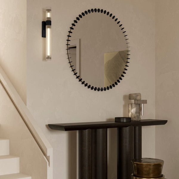 Ray Black mirror with geometric disc frame, handcrafted in Belgium by Deknudt Mirrors